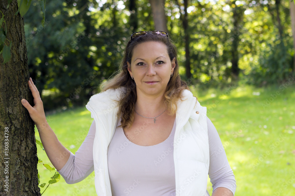 Autumn portrait of charming woman outdoors Autumn portrait of charming woman outdoors