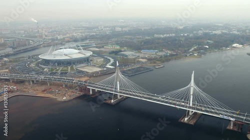 Aerial view of the stadium Zenit arena and modern Cable stayed bridge across the Neva a part of WHSD photo