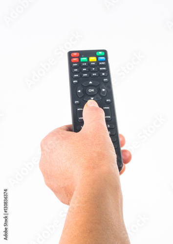 hand holding a remote control