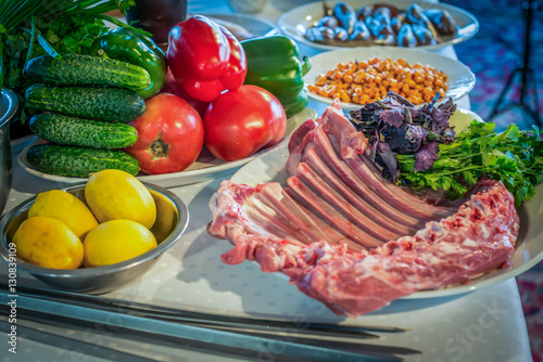 ingredients for cooking meat and vegetables photo