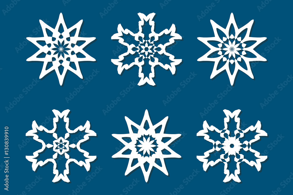 Obraz premium Snowflake set. Laser cut pattern for christmas paper cards, wood carving, paper cutting, design elements, scrapbooking. Collection of different white snowflakes on blue background
