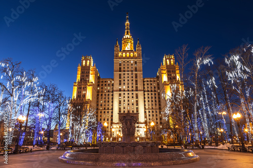 High-rise building on Uprising square in christmas decoration at night, Moscow, Russia