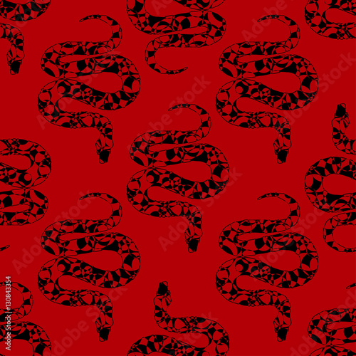 Hand drawn snakes silhouettes simless pattern