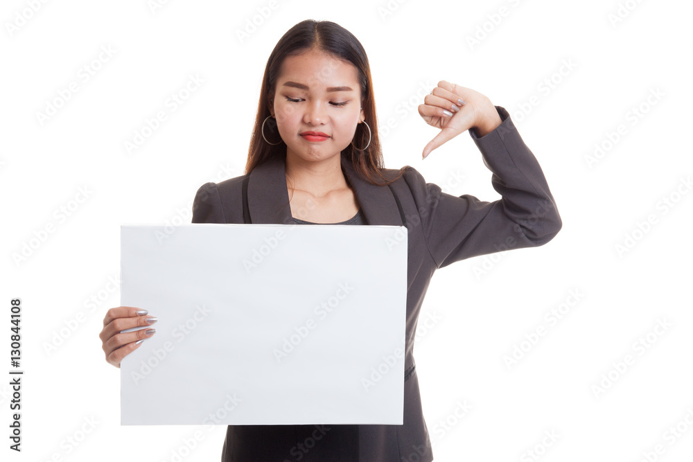 Young Asian business woman show thumbs down with white blank si Young Asian business woman show thumbs down with white blank si
