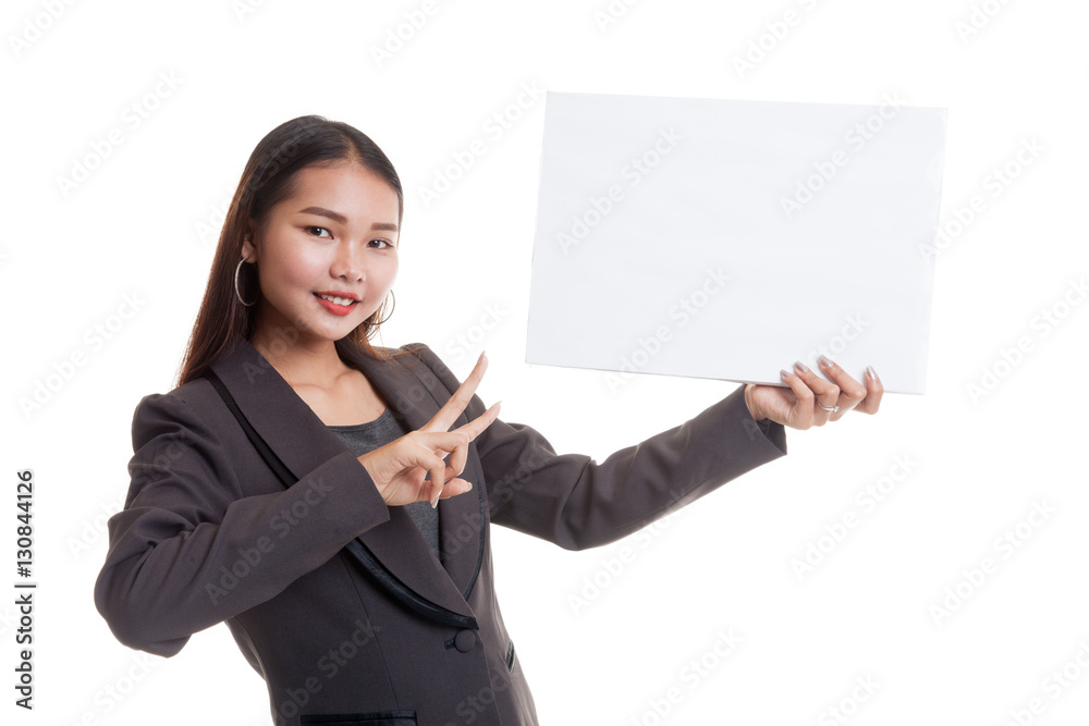 Young Asian business woman show victory sign with blank sign. Young Asian business woman show victory sign with blank sign.