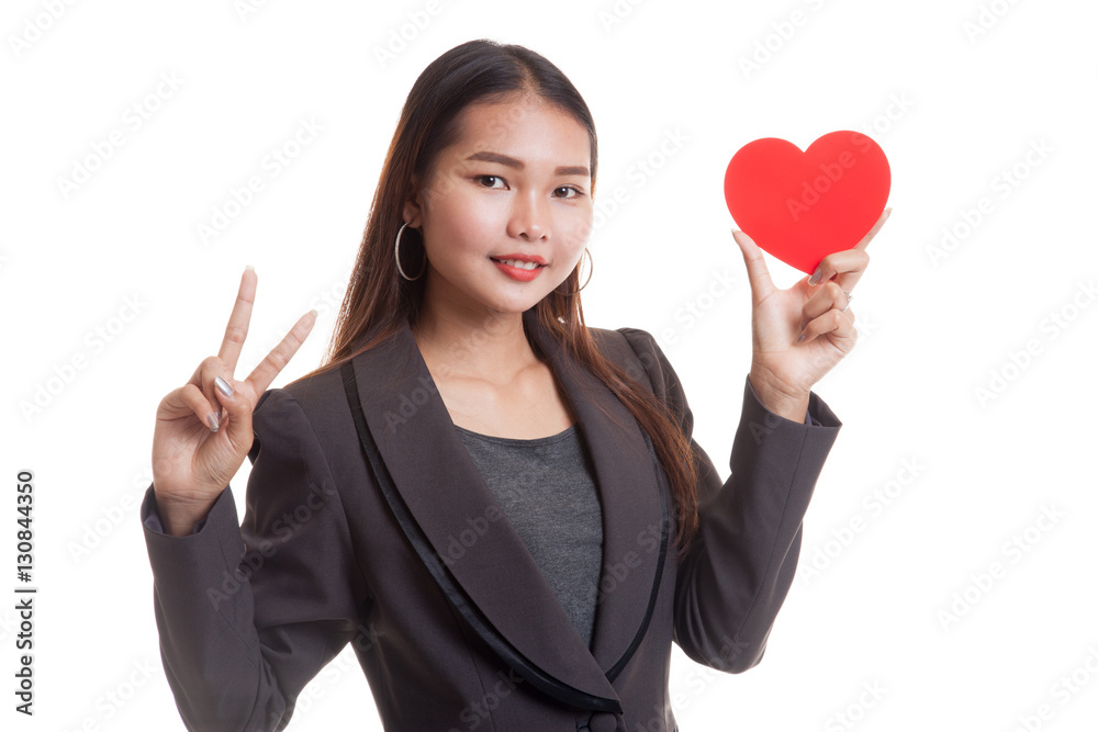 Asian business woman show victory sign with red heart. Asian business woman show victory sign with red heart.