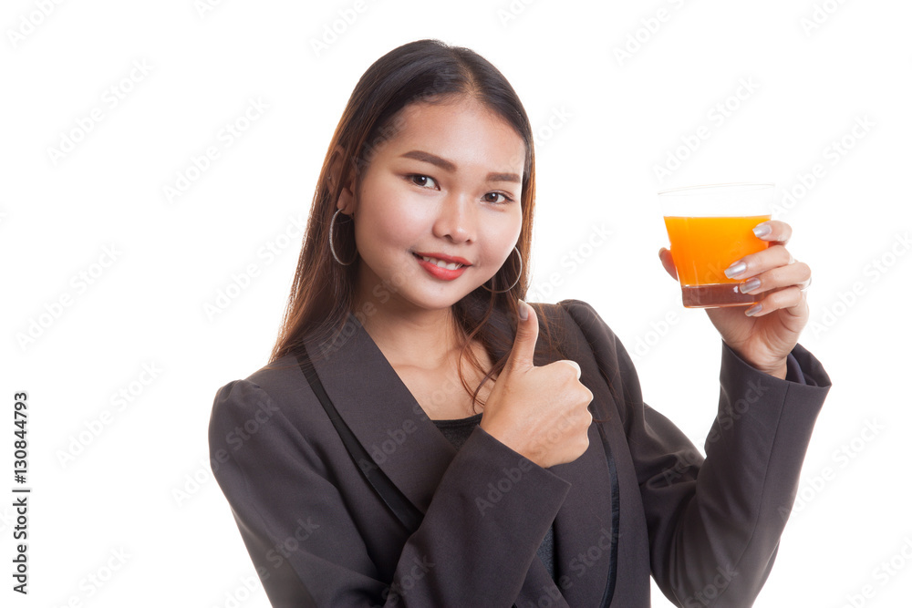 Young Asian woman thumbs up drink orange juice. Young Asian woman thumbs up drink orange juice.