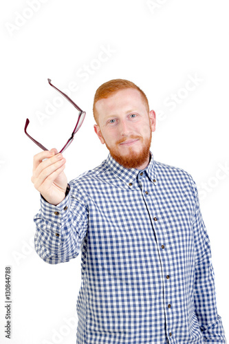 Red-haired man with beard, glasses  and shirt