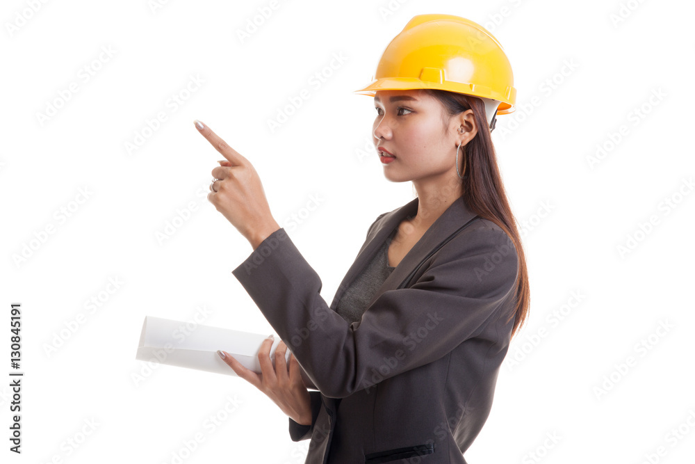 Asian engineer woman pointing with blueprints. Asian engineer woman pointing with blueprints.