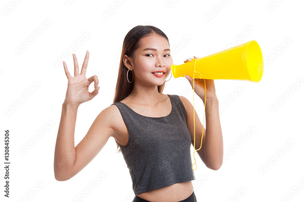Beautiful young Asian woman announce with megaphone Beautiful young Asian woman announce with megaphone