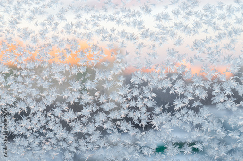frozen crystals on the window, winter background © Sergei Dvornikov