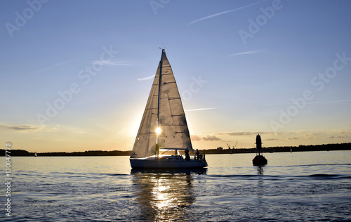 Sonnenuntergang auf Kieler Förde. Sommerstimmung auf Boot. photo