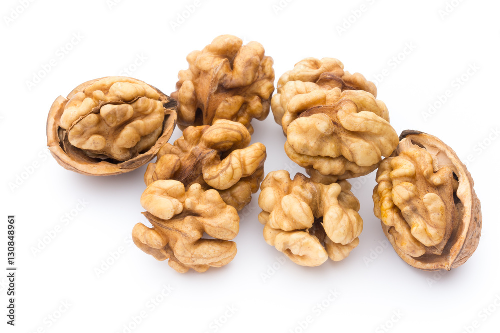 Walnut and walnut kernel isolated on the white background. Walnut and walnut kernel isolated on the white background.