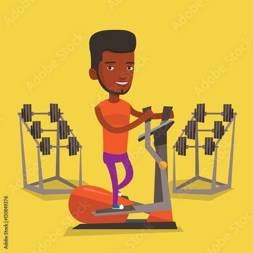 Man exercising on elliptical trainer.