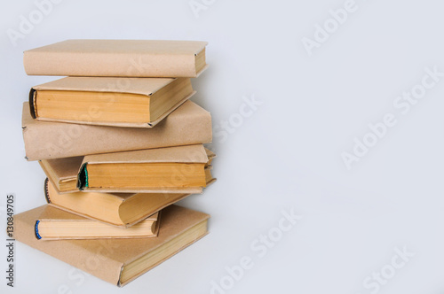 Old books on a white background. Close-up. 