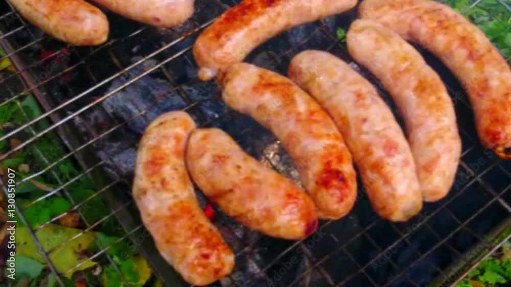 Barbecue hot dog on mangal. Slow motion. Barbecue hot dog on mangal. Slow motion.