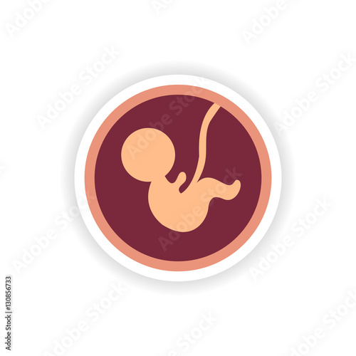 paper sticker on white background child in womb photo