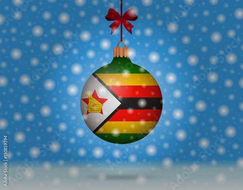 snowfall and snowball with flag of zimbabwe