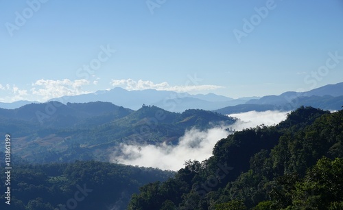 Morning mountain landscape with waves of fog at baan ja bo, Mae © wanchanta
