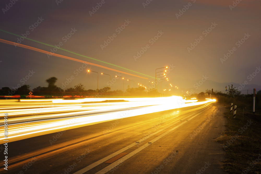 Obraz premium sunset over a highway in the countryside
