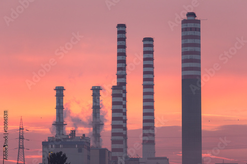 electric plant with pink sunrise