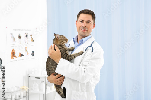 Handsome young veterinarian...