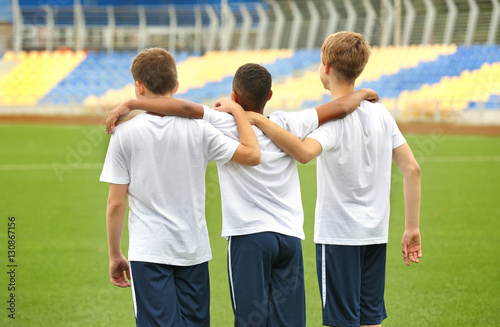 Happy football players at s...