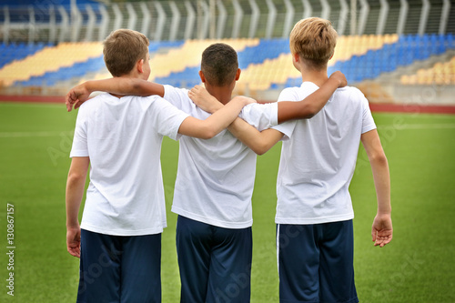Happy football players at s...