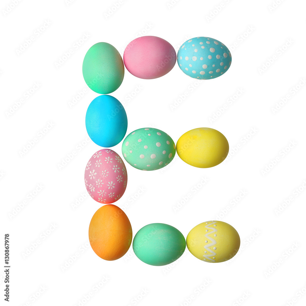 Letter E made of Easter eggs on light background Letter E made of Easter eggs on light background