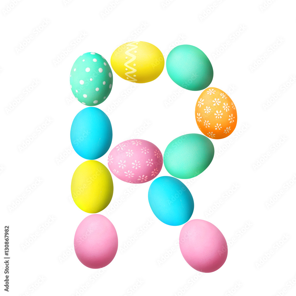 Letter R made of Easter eggs on light background Letter R made of Easter eggs on light background