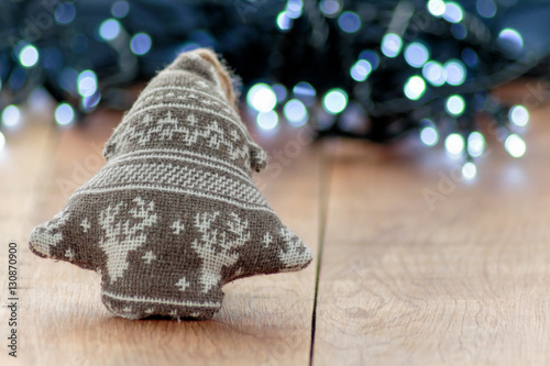 Christmas wool tree snape decoration with out of focus background photo