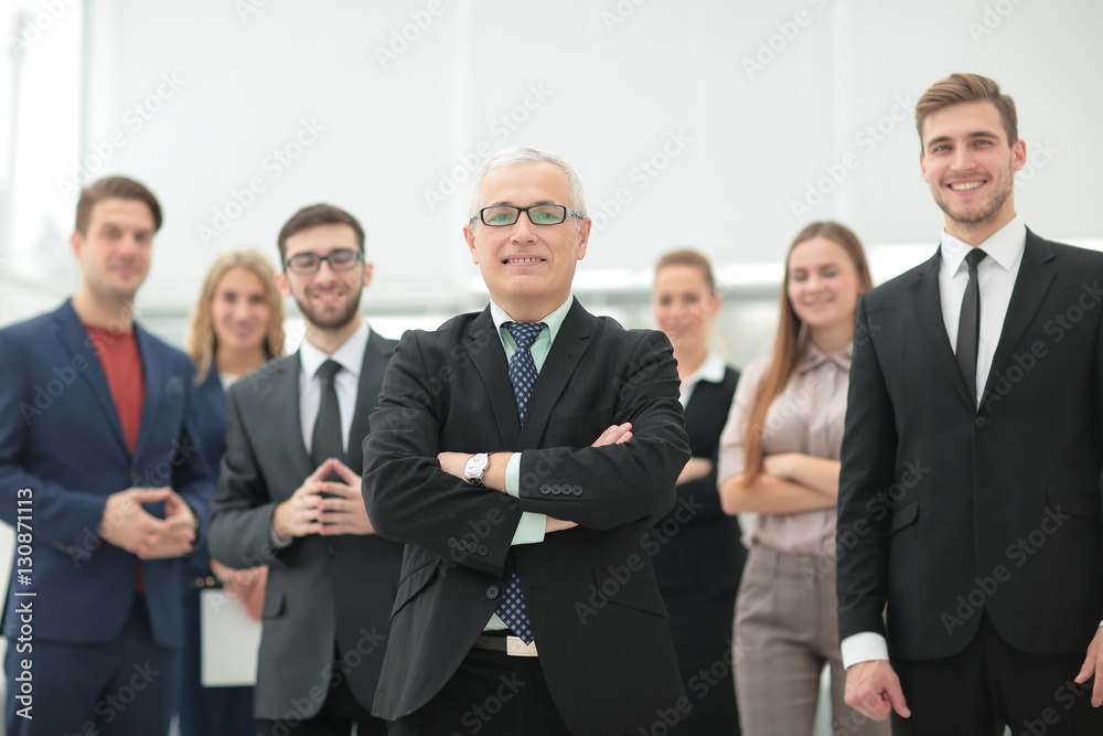 Group of happy successful business people in a meeting at office Group of happy successful business people in a meeting at office