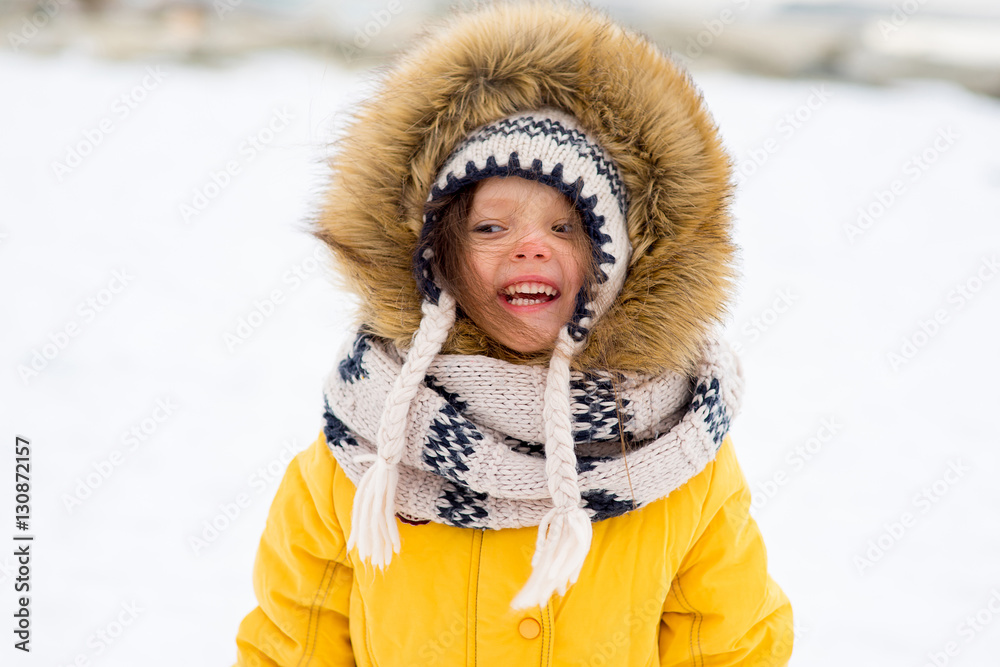 Young girl on the frozen lake