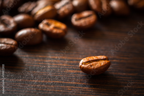 Coffee beans on a dark background. 