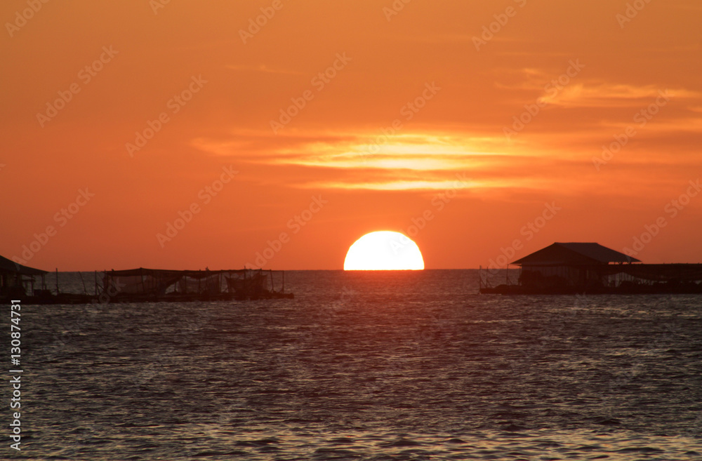 beautiful sunset with sun that goes down over the sea, Karimunja