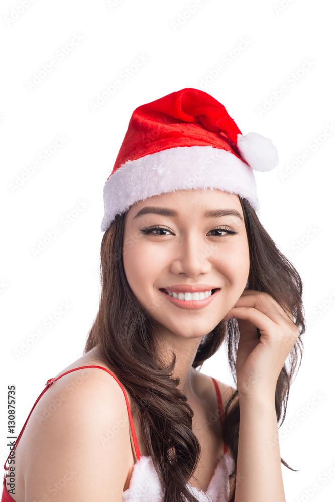 Happy christmas woman wearing a santa hat isolated on white Happy christmas woman wearing a santa hat isolated on white