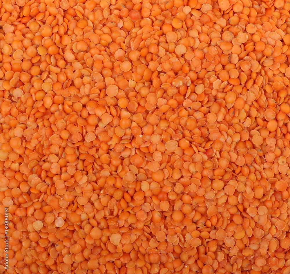 orange lentils background and texture 