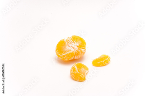one ripe tangerine isolated on white background