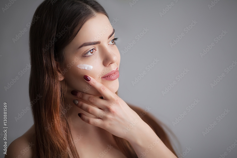 Skin care woman removing face makeup - skin care concept / photos of appealing brunette girl Skin care woman removing face makeup - skin care concept / photos of appealing brunette girl