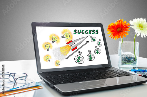 Business success concept on a laptop screen