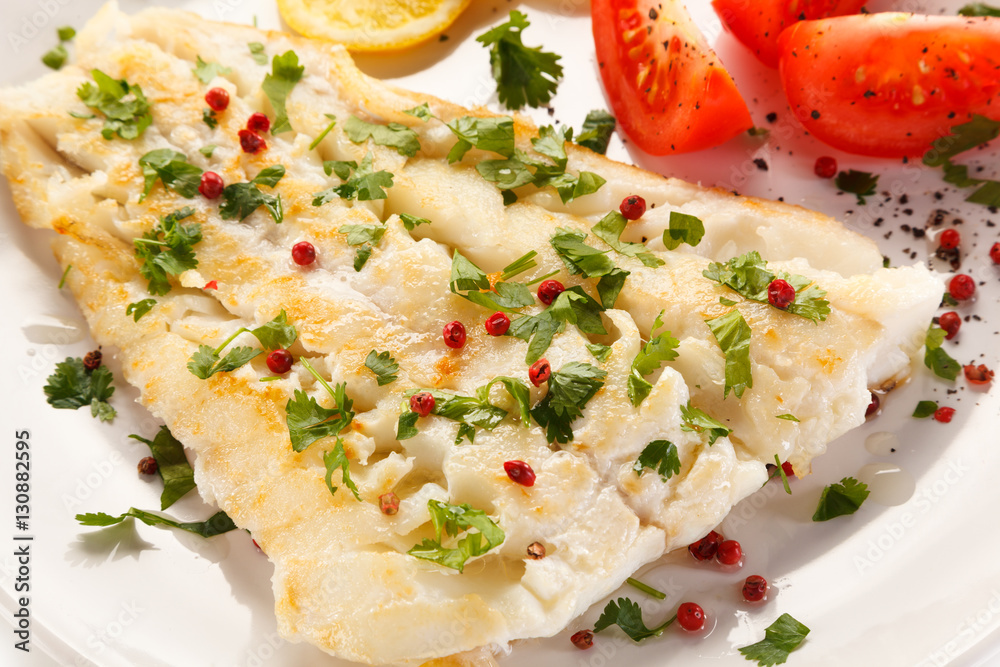 Fish dish - fried fish fillet and vegetables Fish dish - fried fish fillet and vegetables