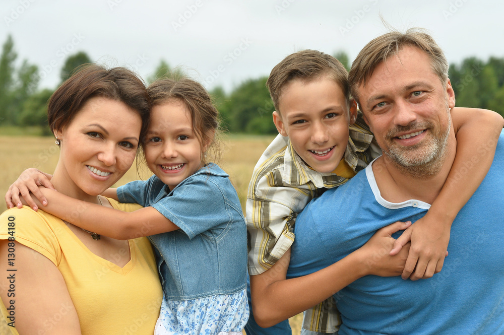 happy family at   field