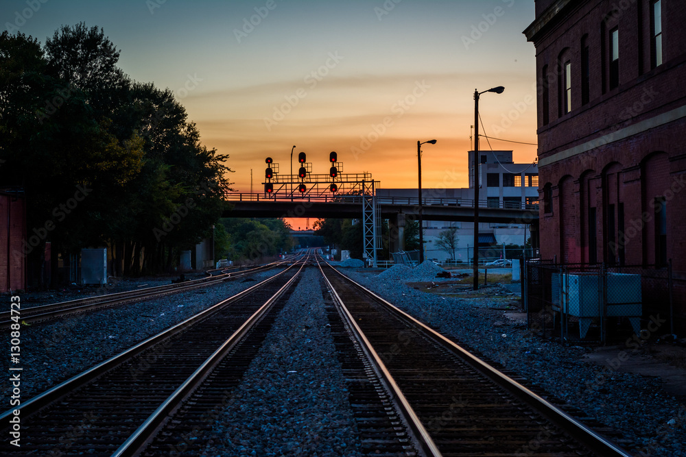 Railroad tracks at sunset, in downtown Greensboro, North Carolin Railroad tracks at sunset, in downtown Greensboro, North Carolin