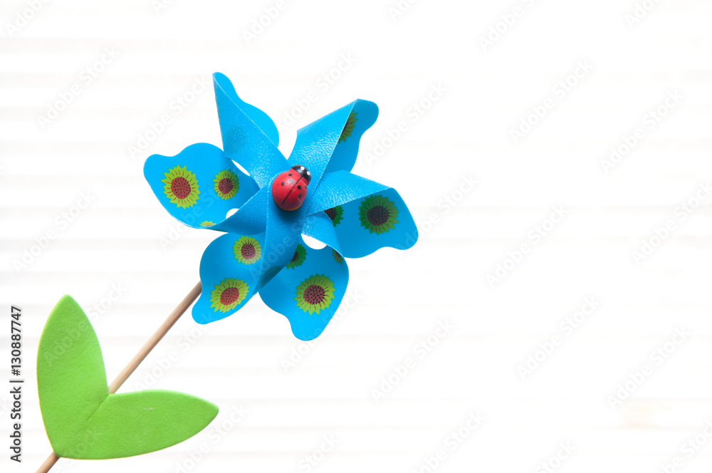 Simple child's toy on white background representing simplicity Simple child's toy on white background representing simplicity