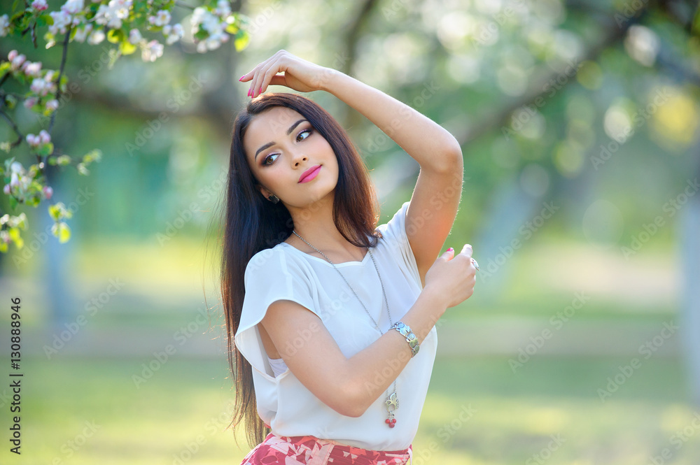 Outdoors portrait of european young woman with luxury spring jew Outdoors portrait of european young woman with luxury spring jew