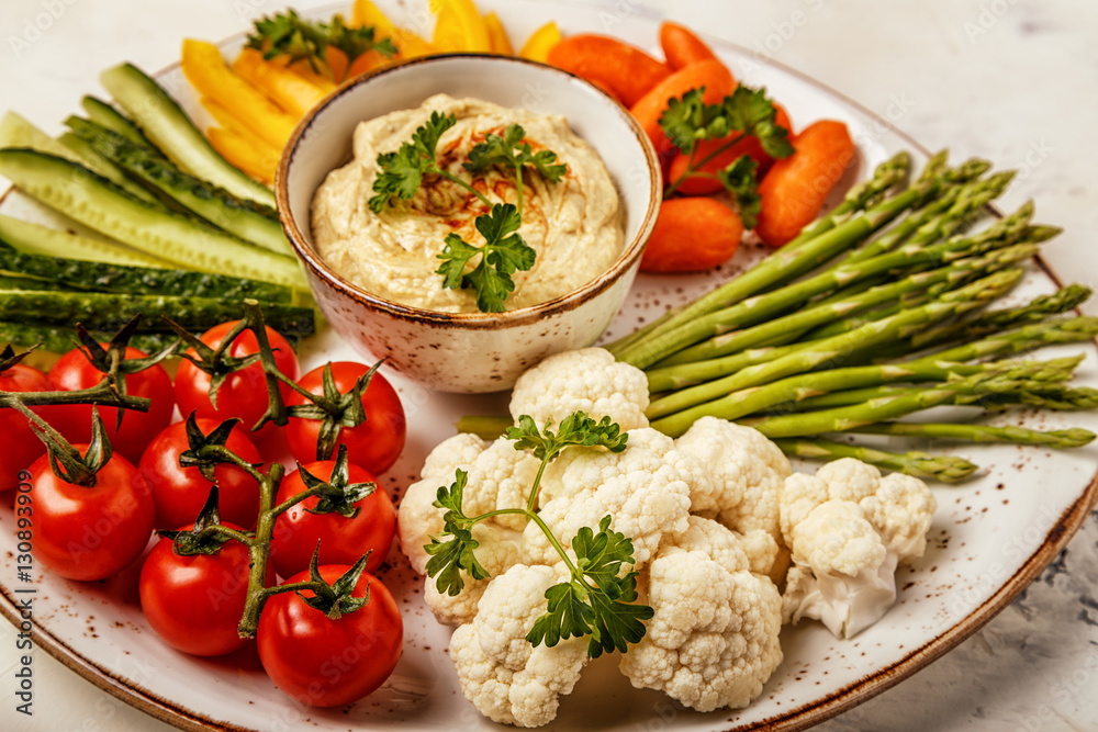 Healthy homemade hummus with assorted fresh vegetables. Healthy homemade hummus with assorted fresh vegetables.