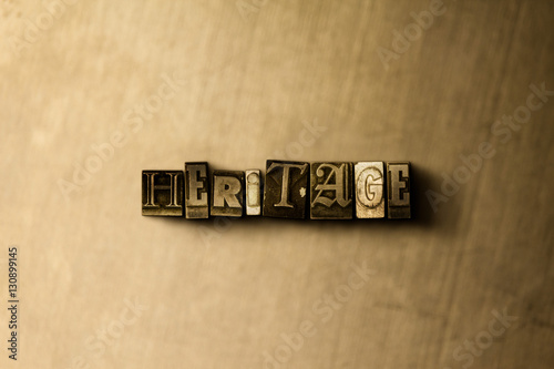 HERITAGE - close-up of grungy vintage typeset word on metal backdrop. Royalty free stock - 3D rendered stock image. Can be used for online banner ads and direct mail.