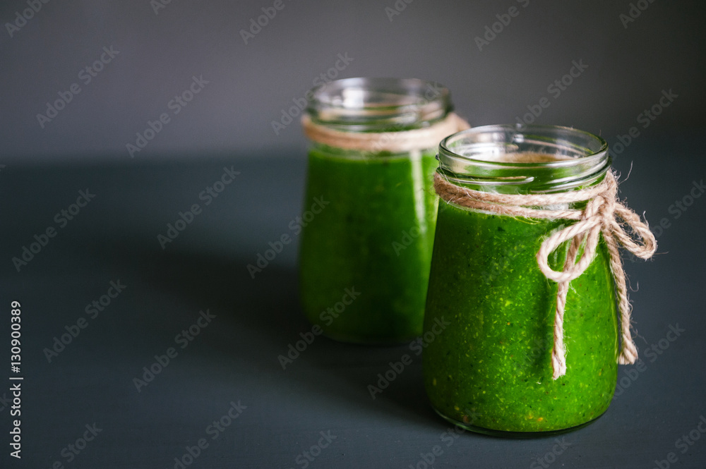 Green smoothies with micro greens, kiwi and orange juice Green smoothies with micro greens, kiwi and orange juice