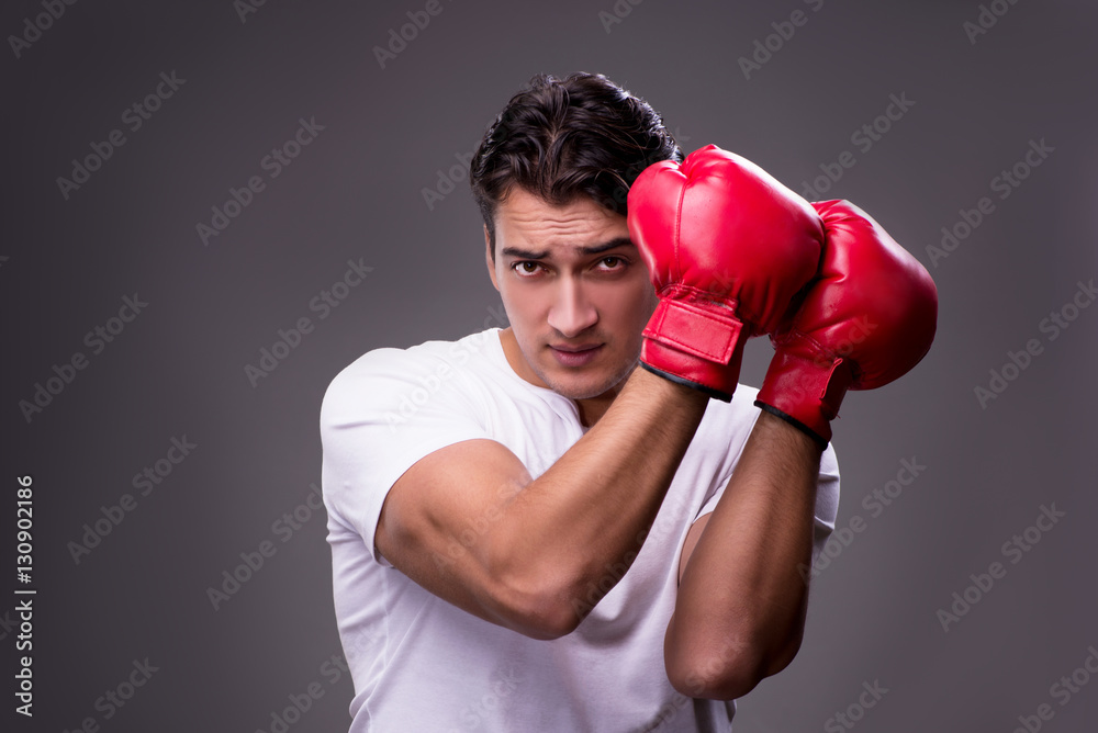 Handsome boxer in boxing concept