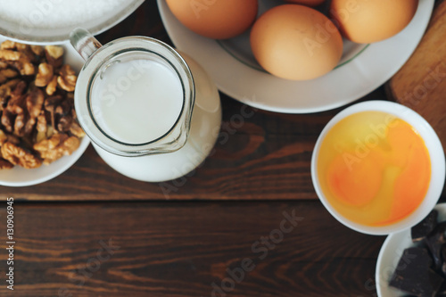 Wallpaper Mural Top view of Baking ingredients for homemade pastry on rustic wood background Torontodigital.ca